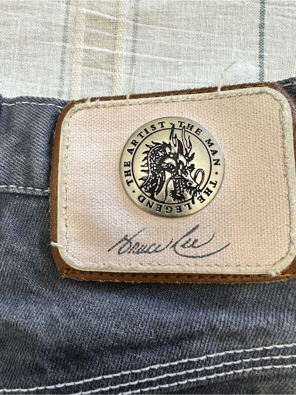 Bruce Lee The Legend Men’s Jeans with Dragon Crest Button